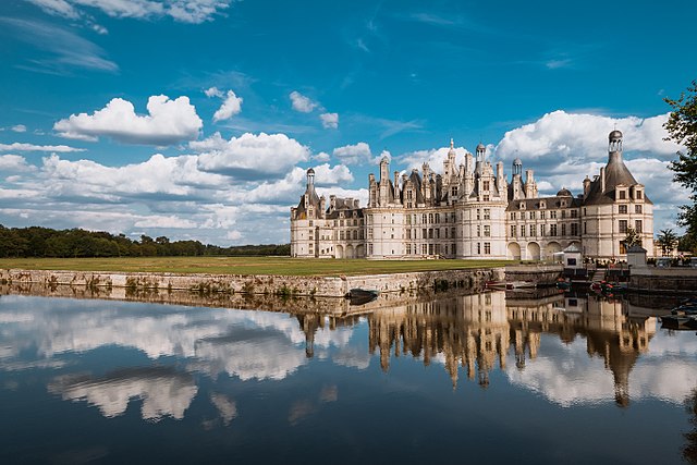 The château and decorative moat viewed from the north-west.