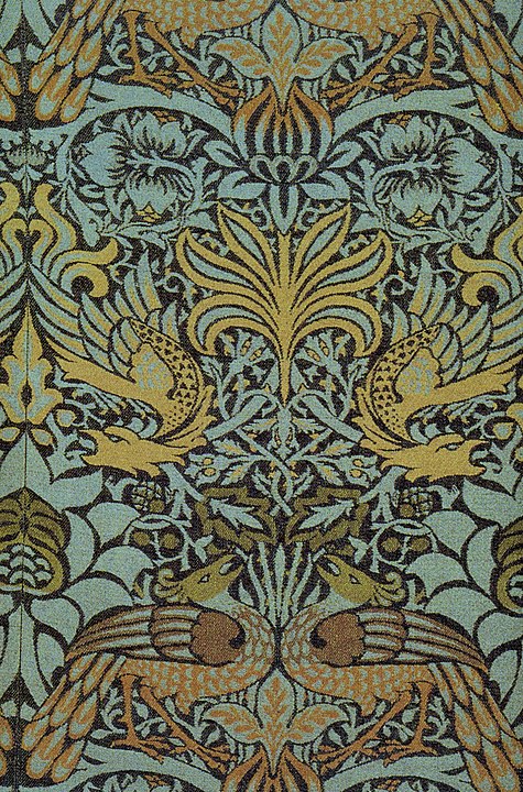 Peacock and Dragon woven woollen fabric designed by William Morris.