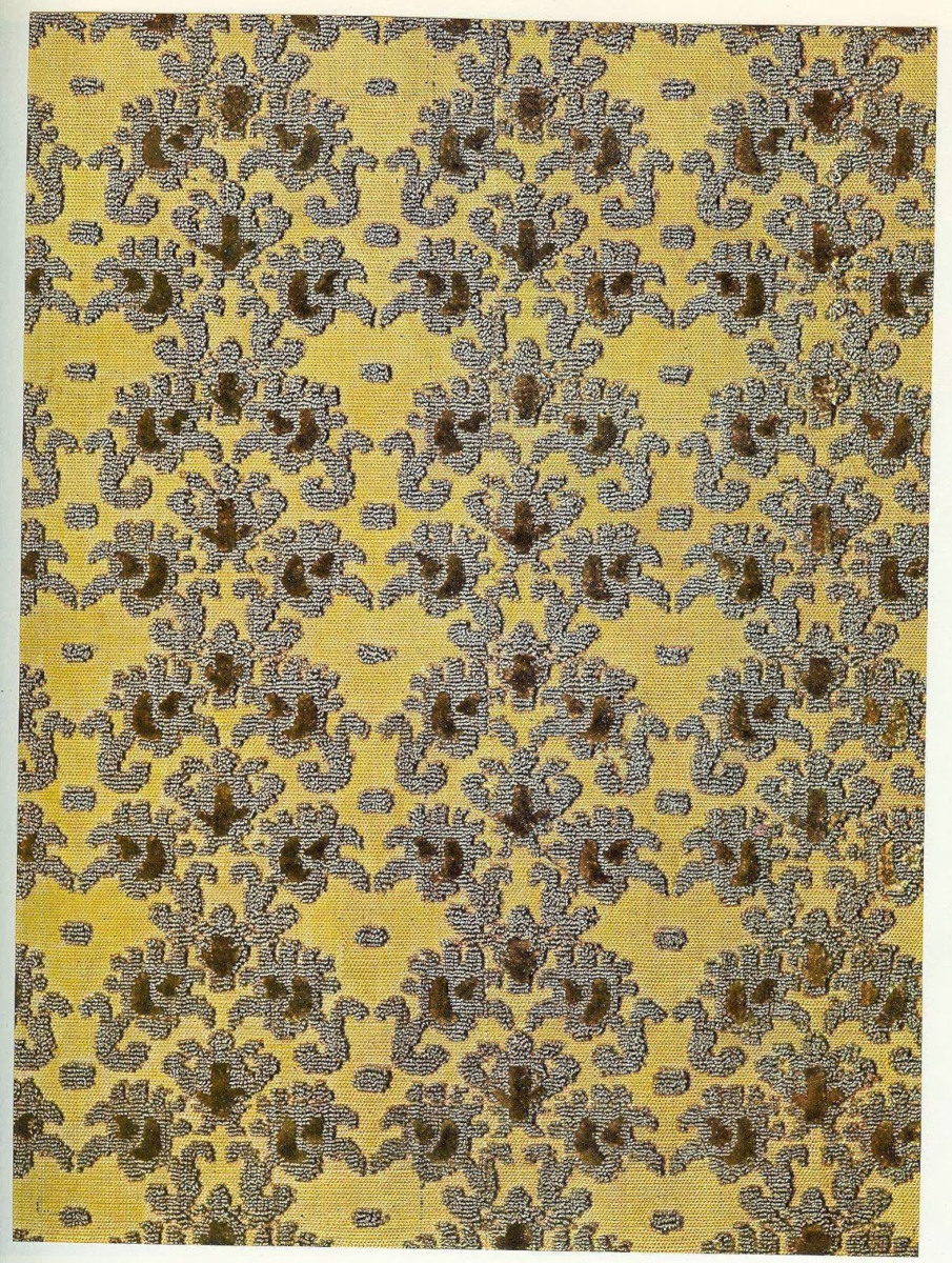 Cut and Uncut Brown Velvet, on yellow ground (portion), showing pattern of small floral motifs arrayed in parallel lines. 16th century, Genoa Museo del Castello Sforzesco, Milan.