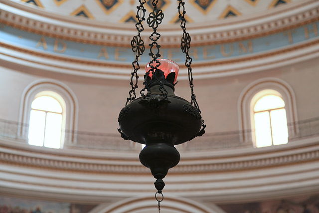 A sanctuary lamp in the interior of the Rotunda of St. Marija Assunta in Mosta, Malta.